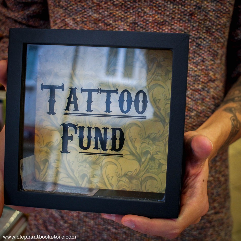 Money Box Tattoo Fund | Elephant Bookstore